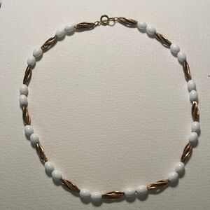 Elegant Gold and White Beaded Necklace